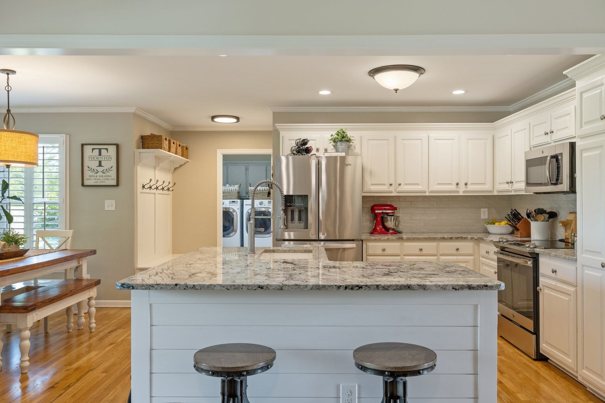 6223 Ladd Road Franklin, TN 37067 - Photo 21 of 67 a kitchen with stainless steel appliances granite countertop a sink and cabinets