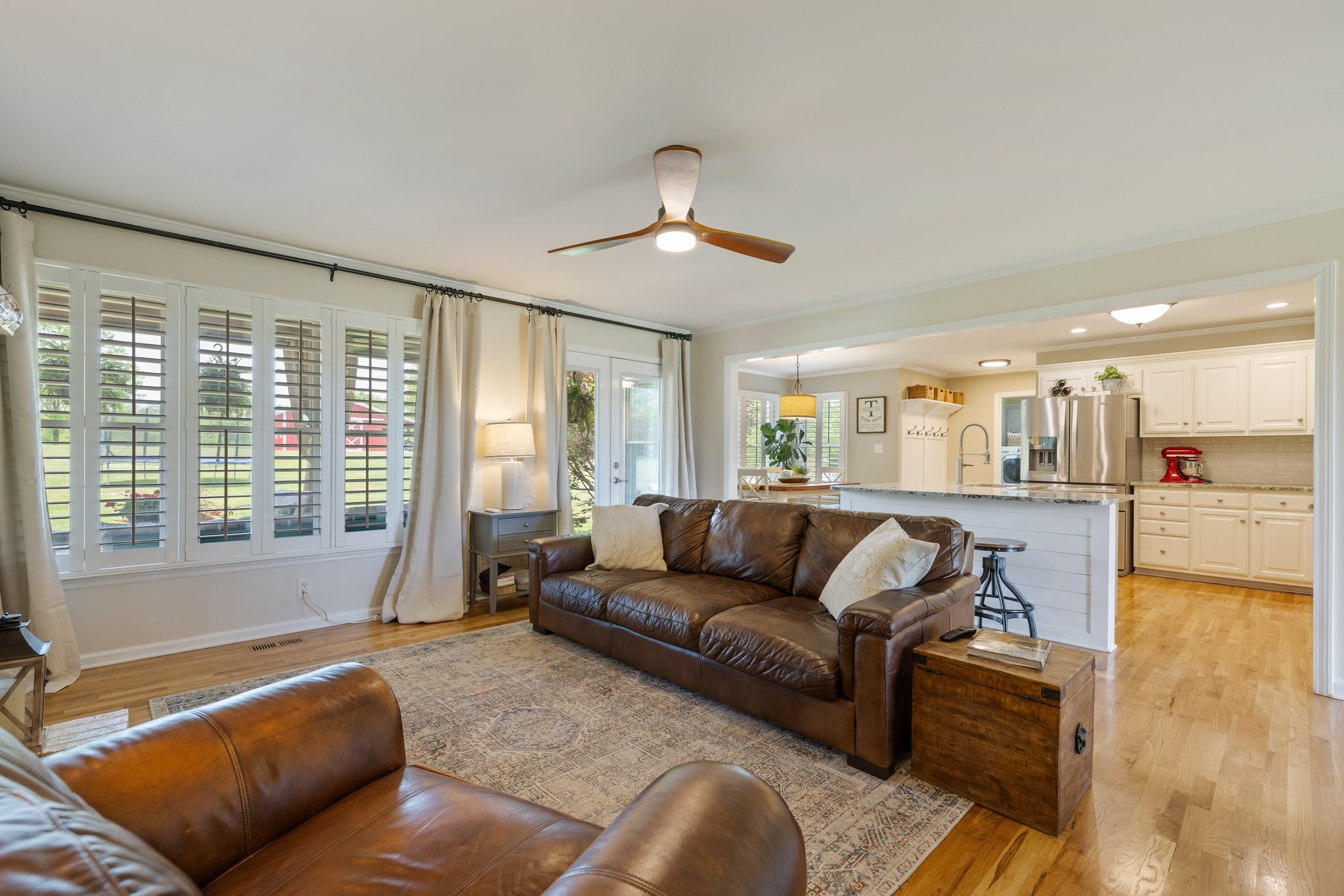 6223 Ladd Road Franklin, TN 37067 - Photo 22 of 67 a living room with furniture and a large window