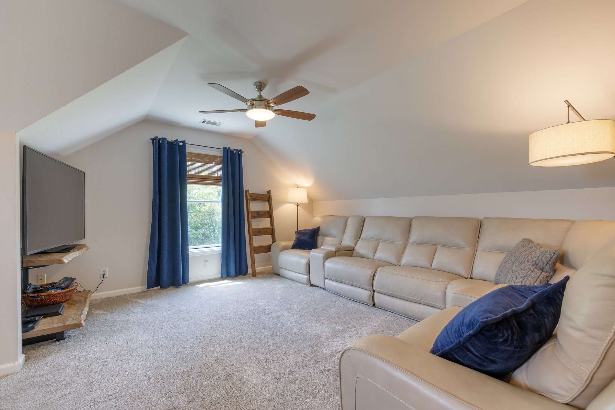 6223 Ladd Road Franklin, TN 37067 - Photo 33 of 67 a living room with furniture and a flat screen tv