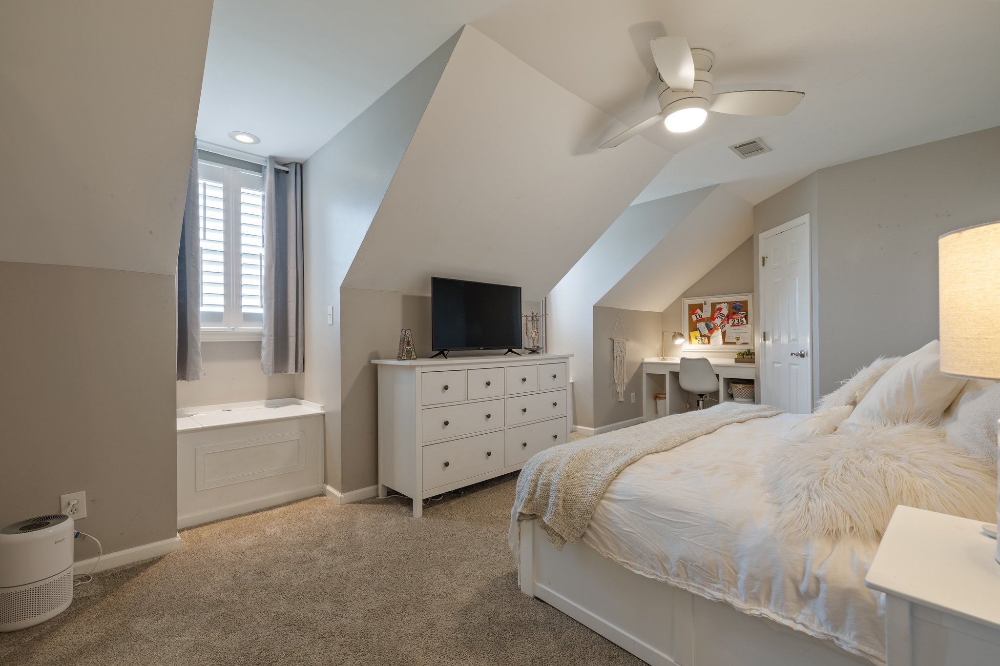 6223 Ladd Road Franklin, TN 37067 - Photo 38 of 67 a bedroom with a bed chandelier and a window