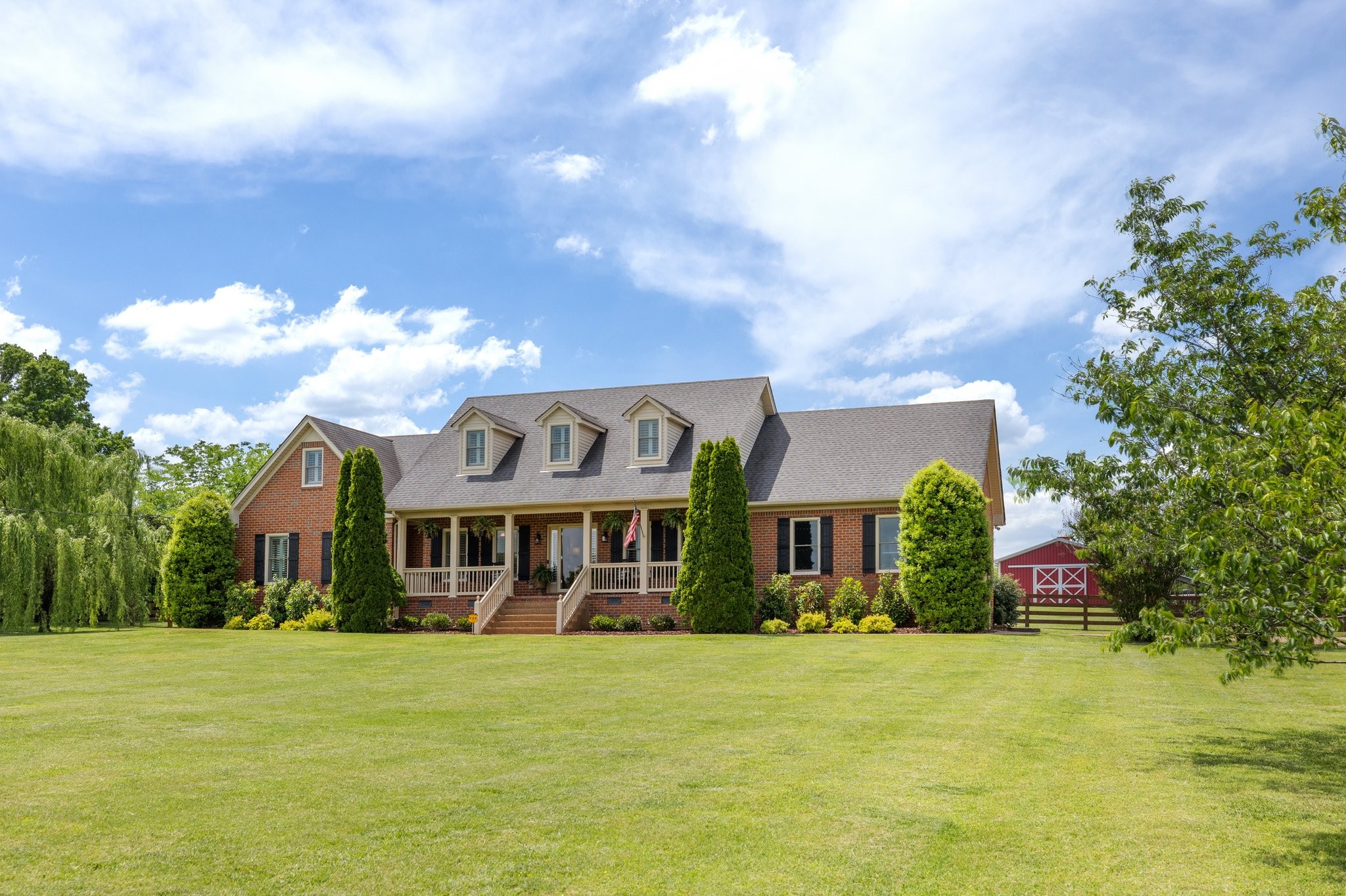 6223 Ladd Road Franklin, TN 37067 - Photo 4 of 67 a front view of house with yard and trees