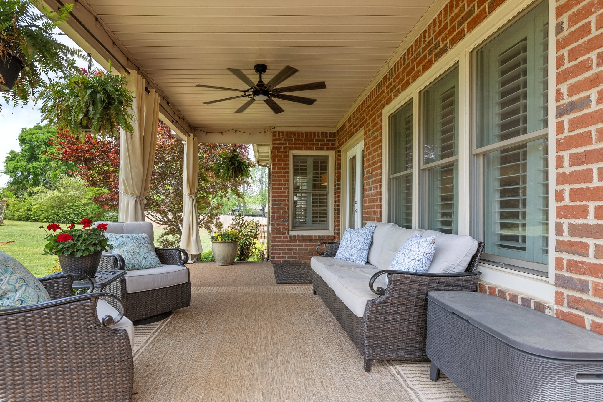 6223 Ladd Road Franklin, TN 37067 - Photo 45 of 67 a living room with patio furniture and a potted plants