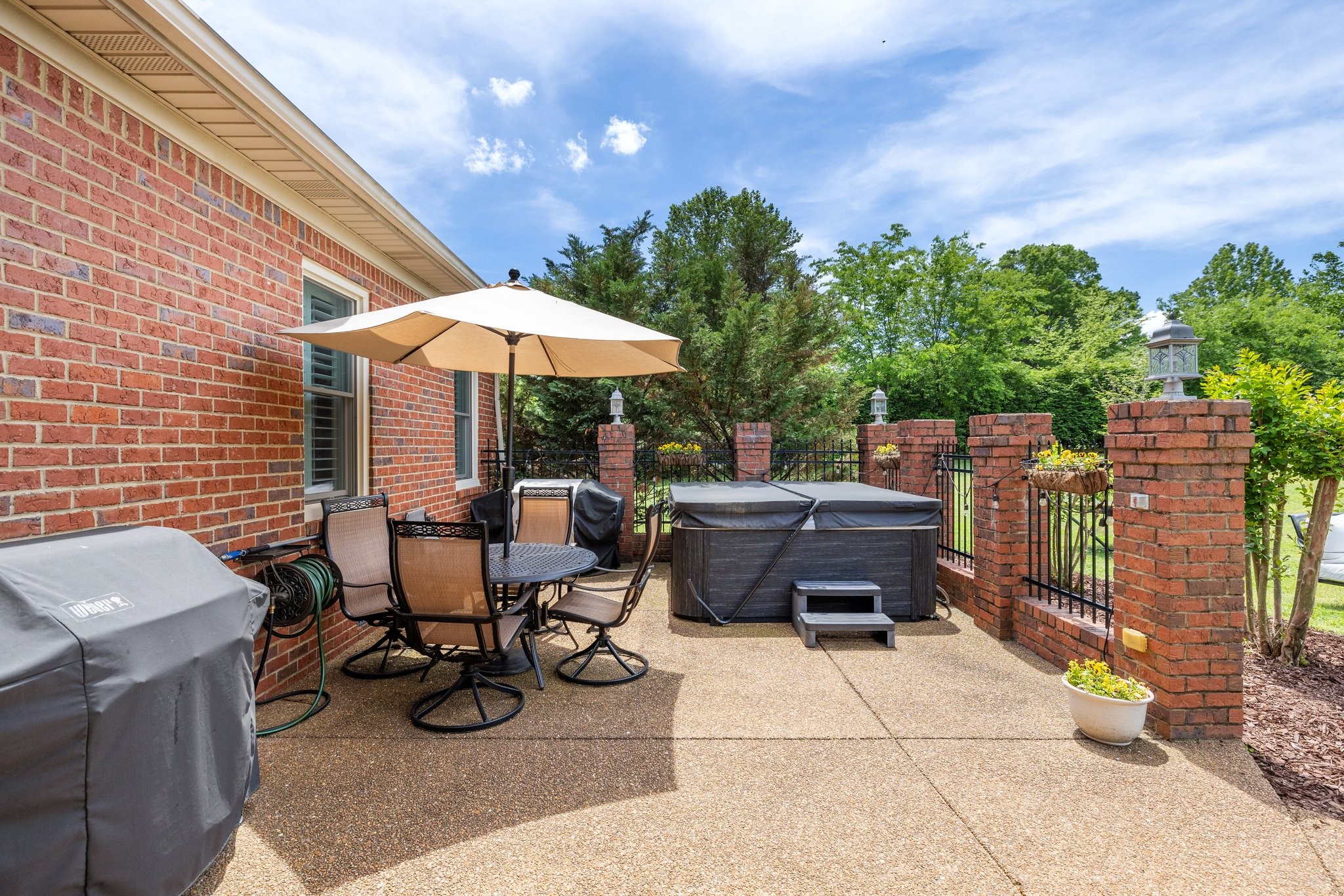 6223 Ladd Road Franklin, TN 37067 - Photo 47 of 67 a view of a patio with chairs and potted plants