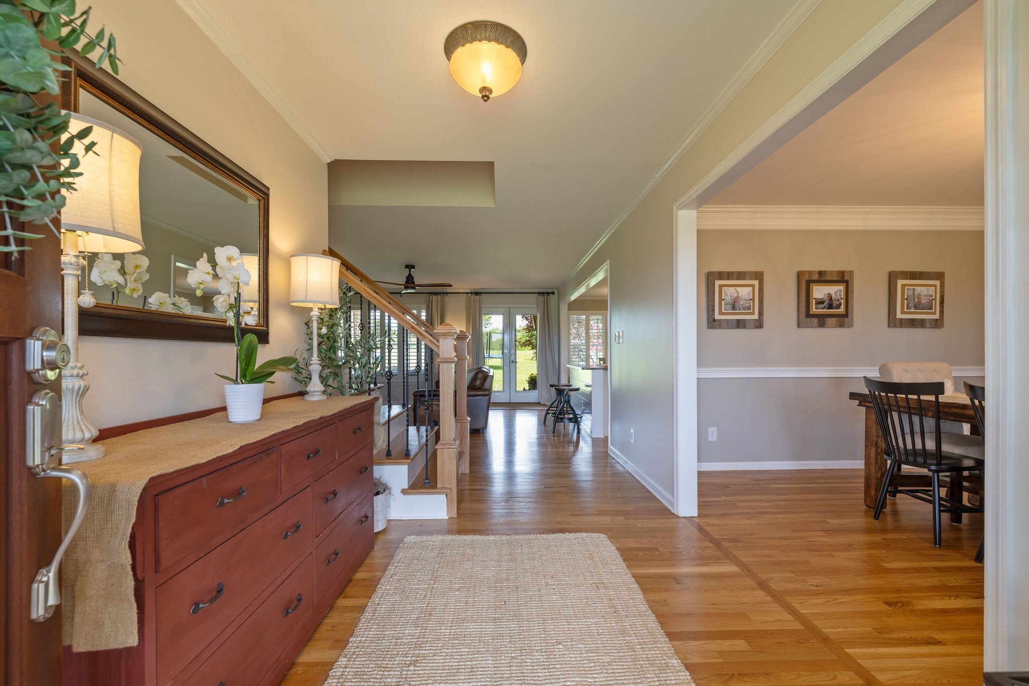 6223 Ladd Road Franklin, TN 37067 - Photo 8 of 67 a room with lots of wooden furniture and potted plant