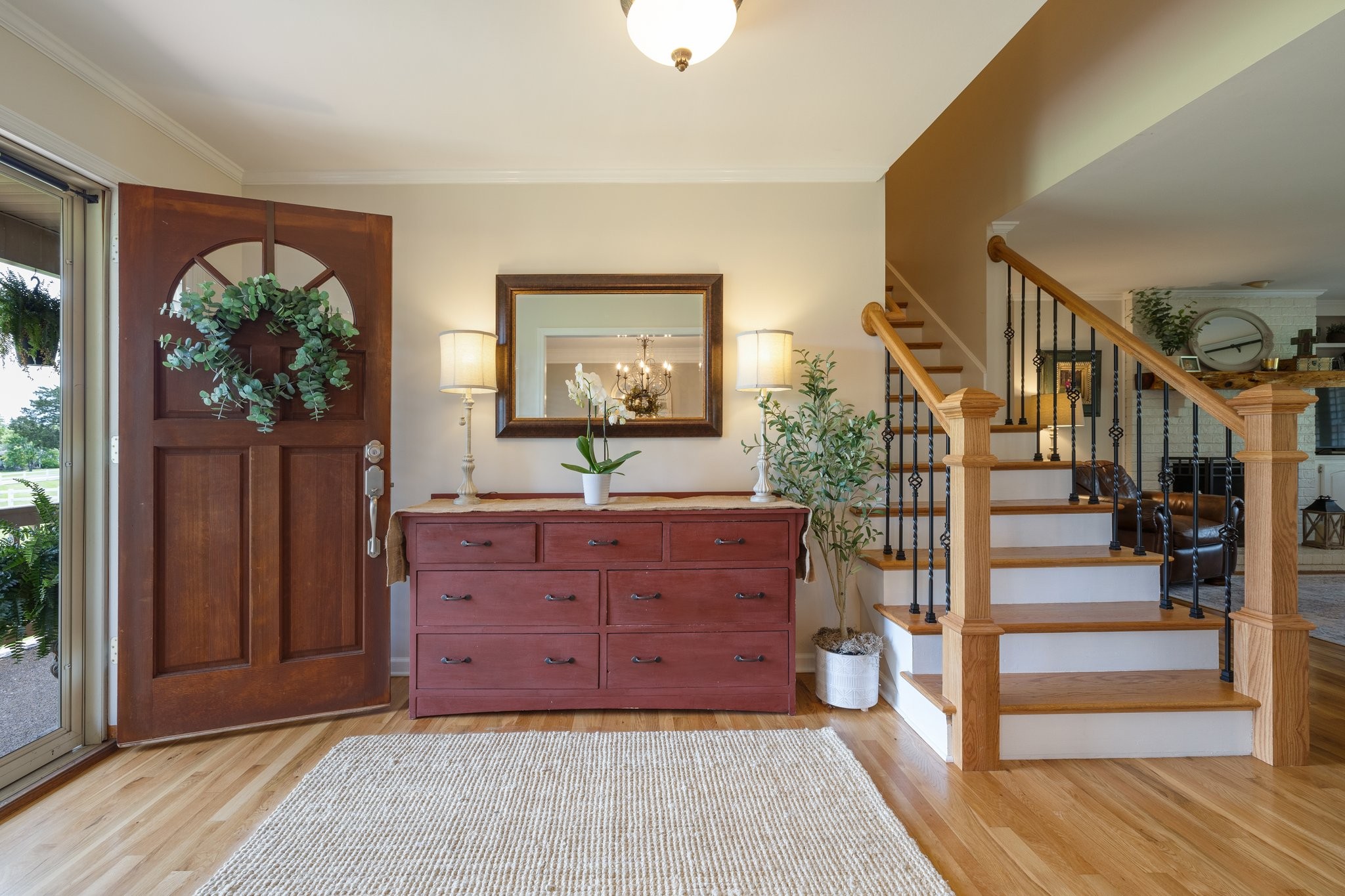 6223 Ladd Road Franklin, TN 37067 - Photo 9 of 67 a room with a dresser and a wooden floor