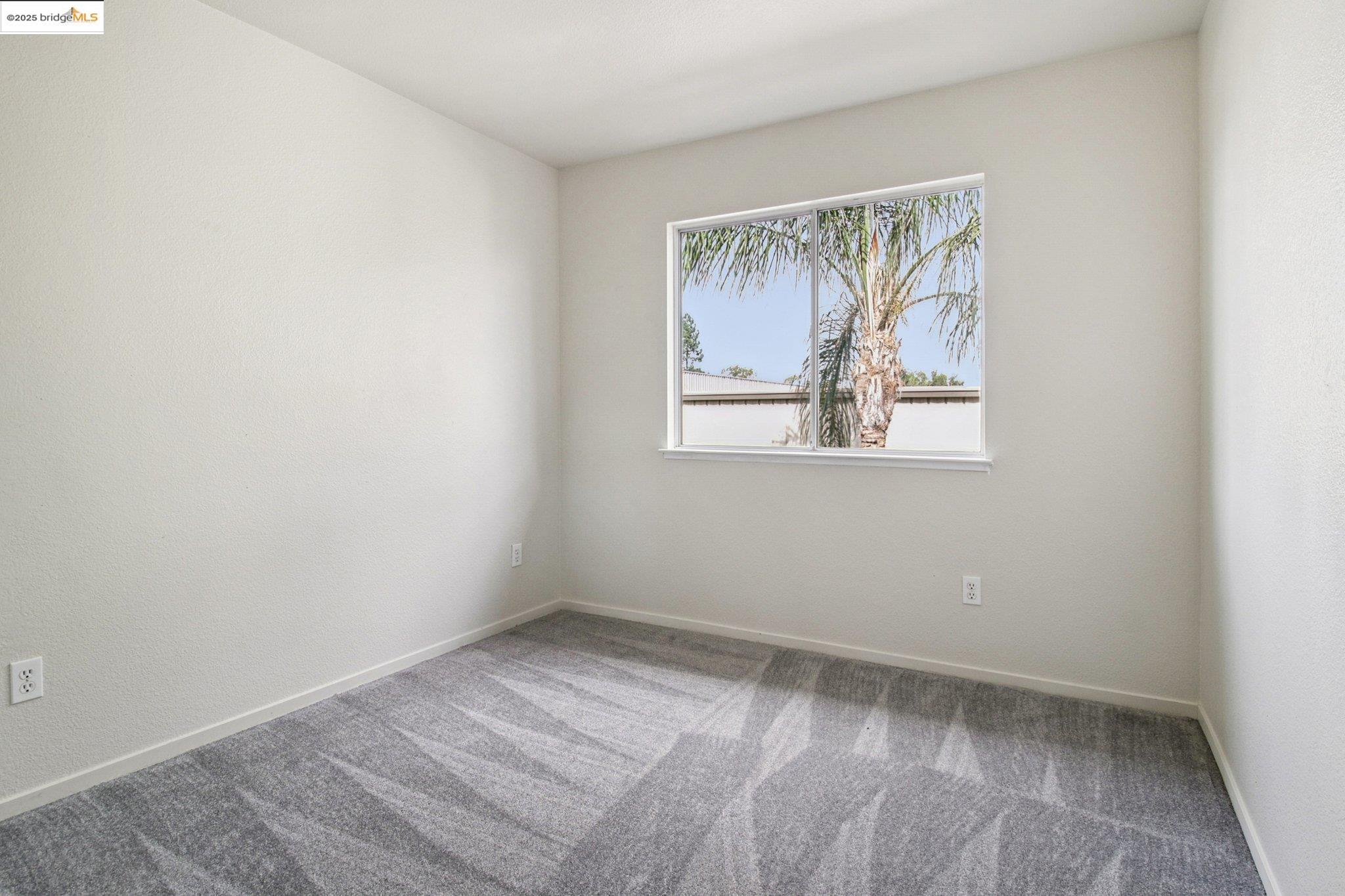 1559 Freed Circle Pittsburg, CA 94565 - Photo 17 of 32 an empty room with a window