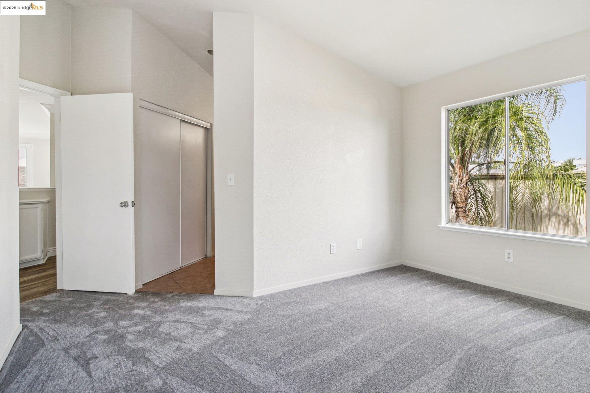 1559 Freed Circle Pittsburg, CA 94565 - Photo 20 of 32 an empty room with windows and closet