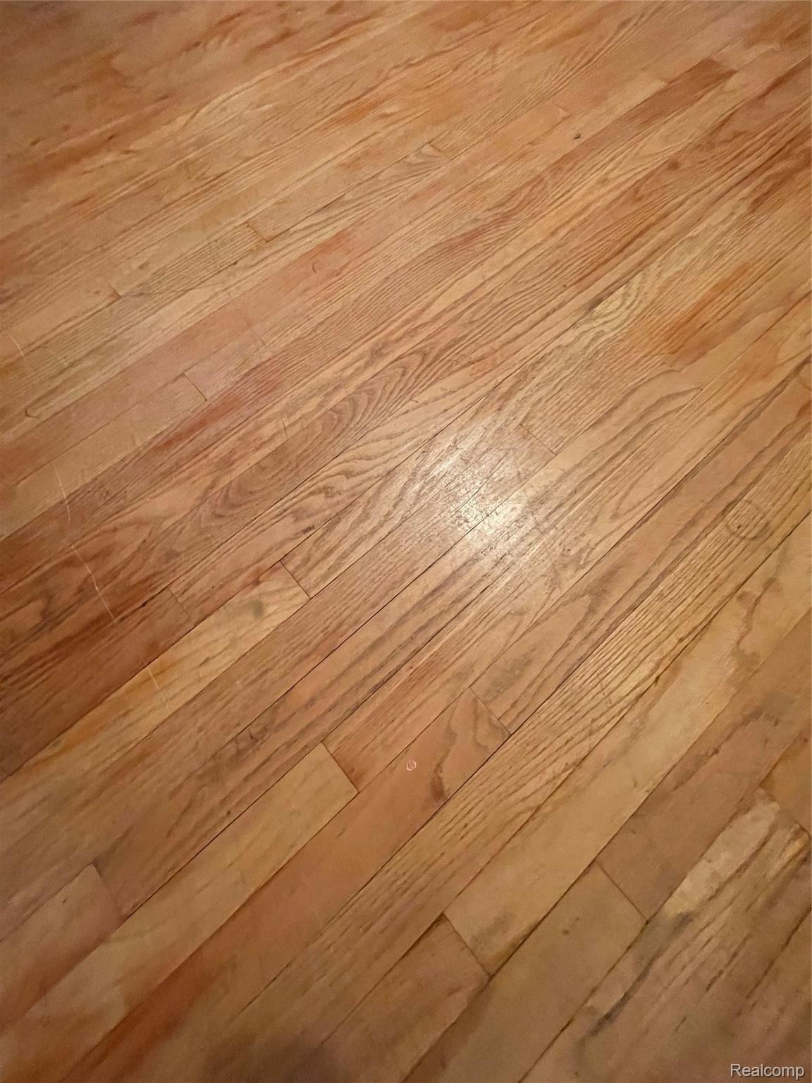 2700 East Wardlow Road Highland, MI 48356 - Photo 26 of 30 WARDLOW HARDWOOD FLOORS.jpg