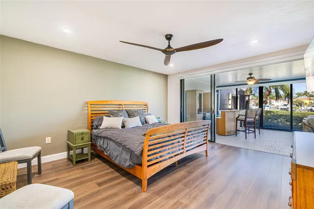 a bedroom with a bed and a table