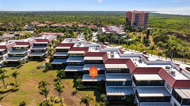 a view of a balcony with chairs