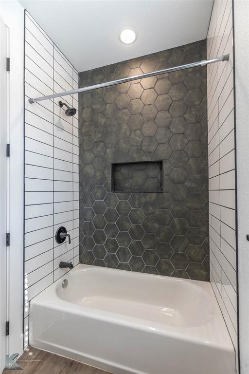 3325 Ace Abilene, TX 79606 - Photo 35 of 40 a bathroom with a bathtub and shower