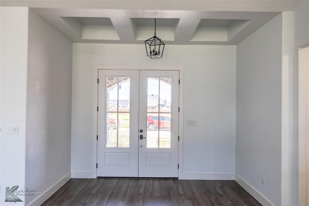 3325 Ace Abilene, TX 79606 - Photo 4 of 40 a view of an entryway with wooden floor