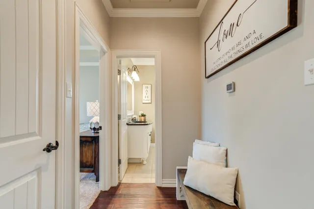 a bedroom with a bed and a table in it