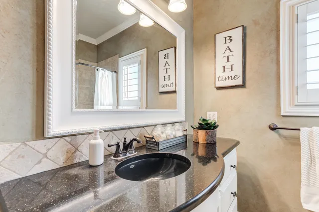 a patio with table and chairs