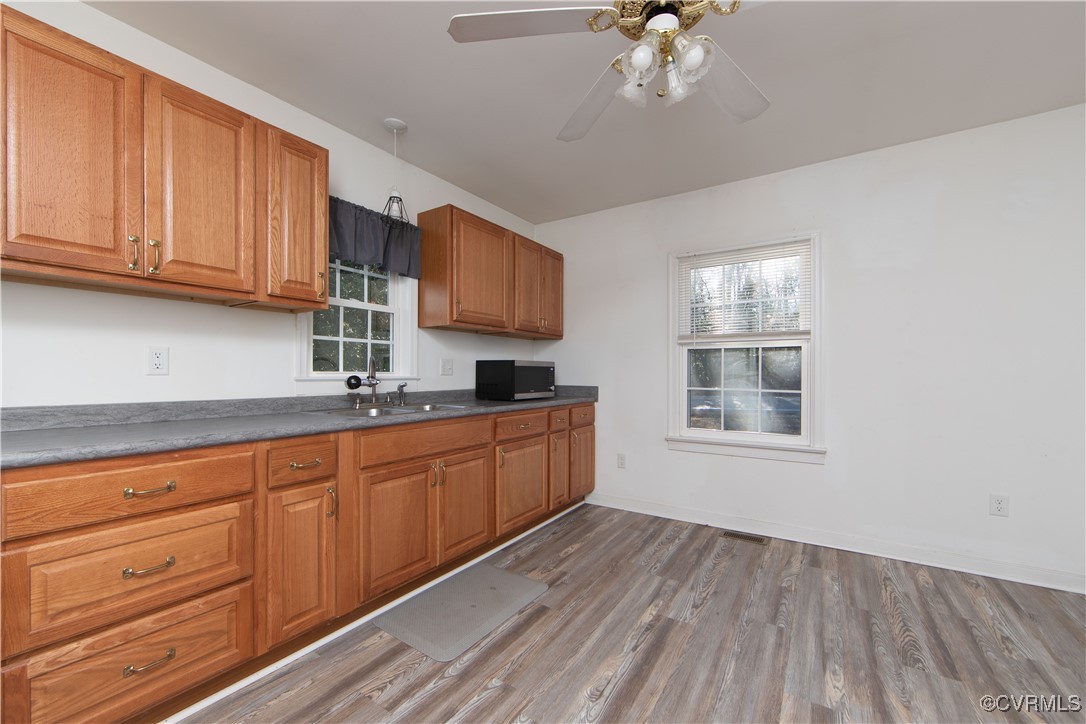 2015 Hicks Road Richmond, VA 23235 - Photo 11 of 31 Kitchen featuring ceiling fan, wood-type flooring,