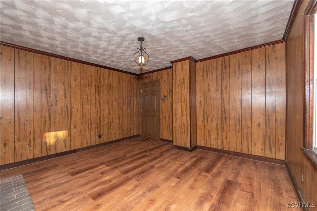 2015 Hicks Road Richmond, VA 23235 - Photo 17 of 31 Empty room with hardwood / wood-style flooring, cr