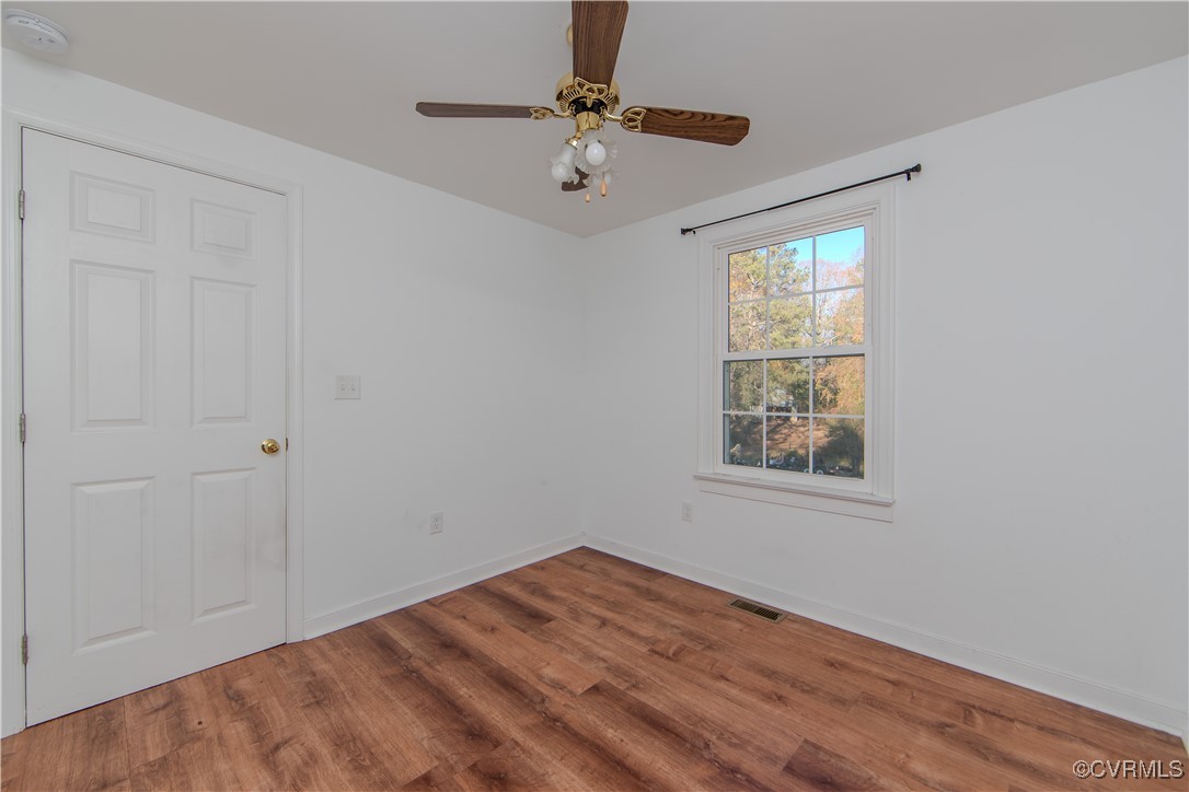 2015 Hicks Road Richmond, VA 23235 - Photo 19 of 31 Spare room with ceiling fan and hardwood / wood-st