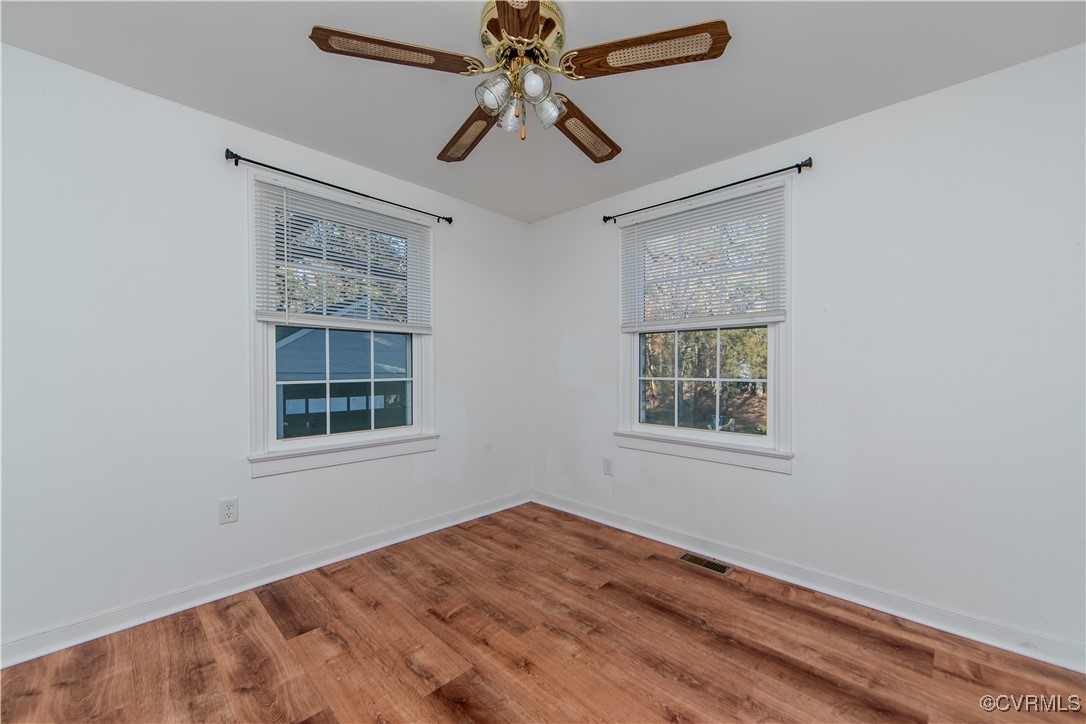 2015 Hicks Road Richmond, VA 23235 - Photo 21 of 31 Spare room featuring hardwood / wood-style floorin