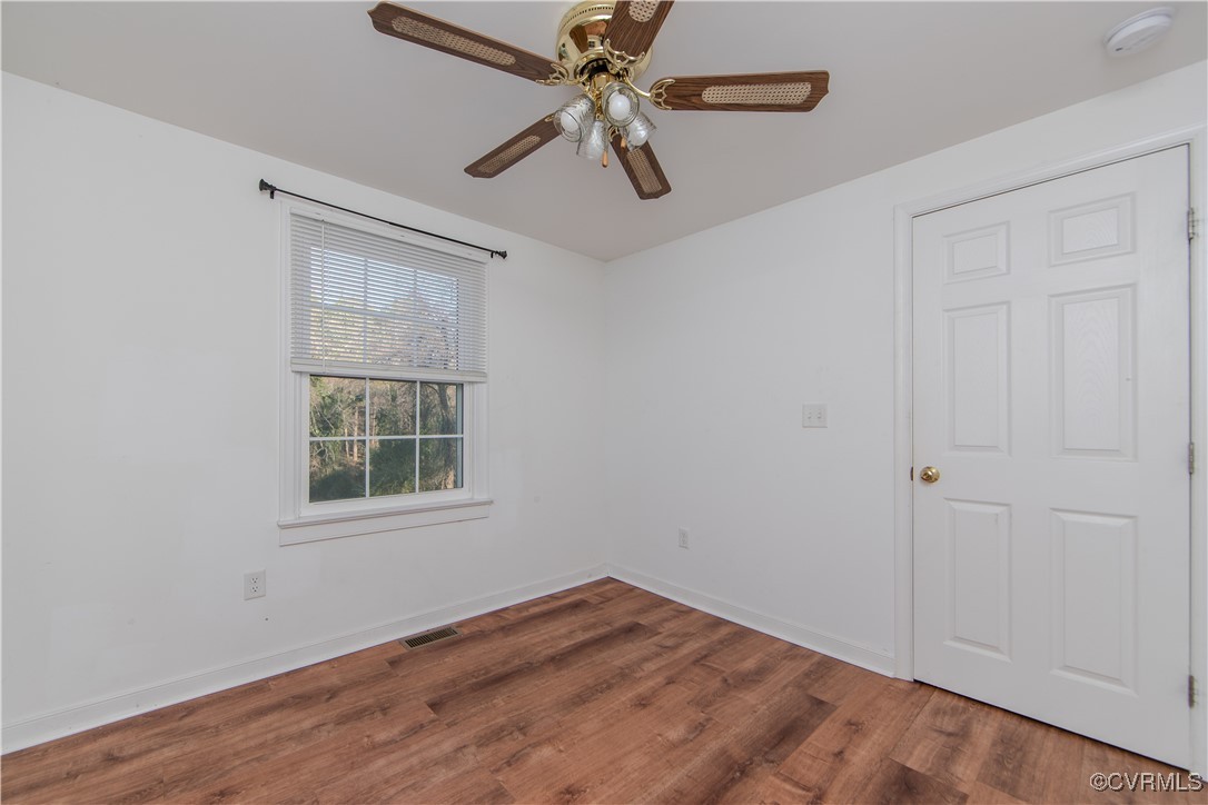 2015 Hicks Road Richmond, VA 23235 - Photo 22 of 31 Spare room with ceiling fan and hardwood / wood-st