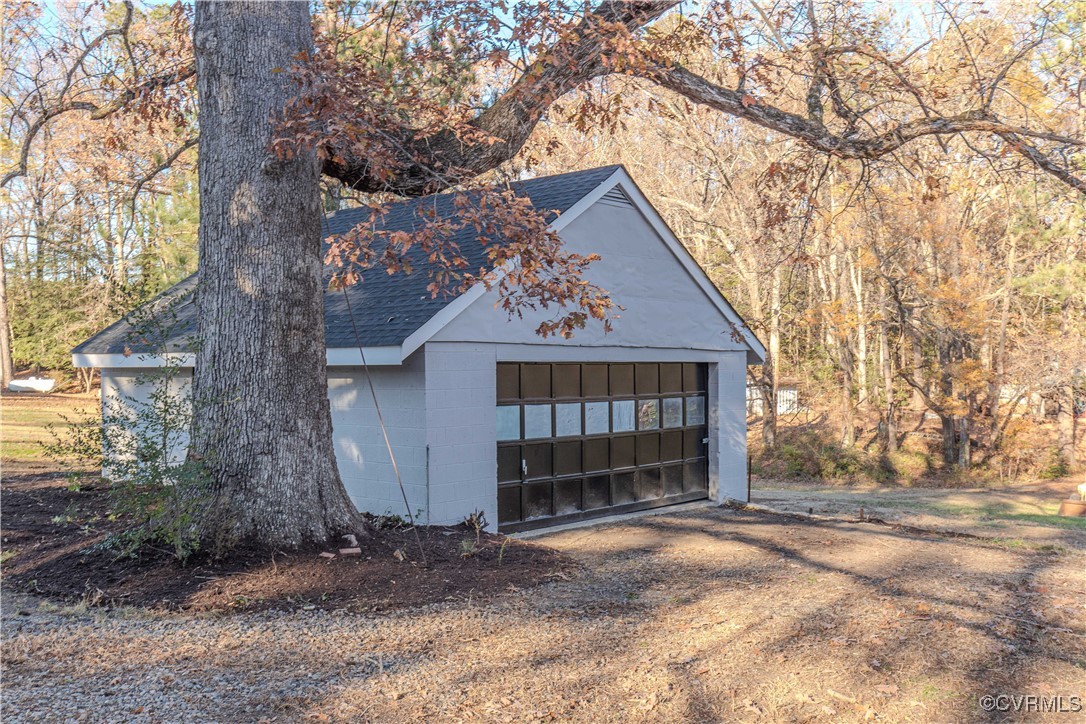 2015 Hicks Road Richmond, VA 23235 - Photo 24 of 31 View of outbuilding featuring a garage