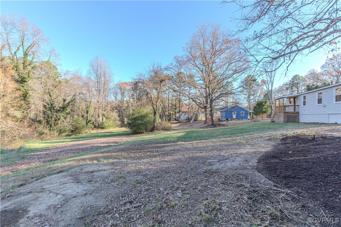 2015 Hicks Road Richmond, VA 23235 - Photo 27 of 31 View of yard with a deck