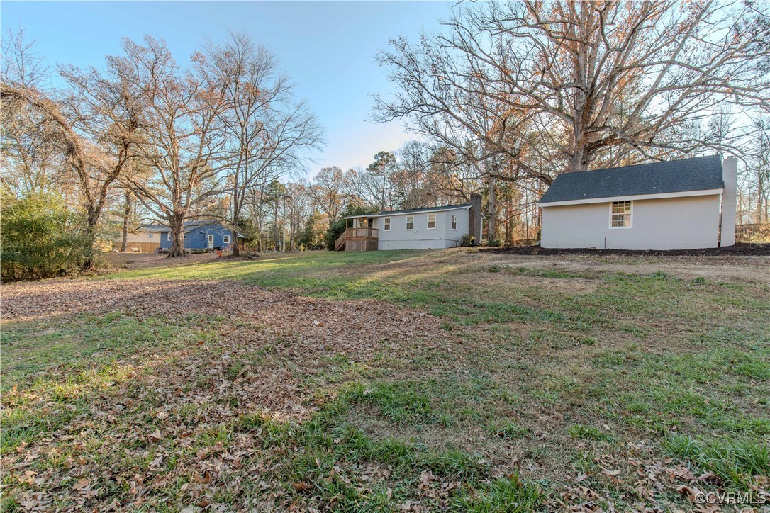 2015 Hicks Road Richmond, VA 23235 - Photo 28 of 31 View of yard with an outbuilding