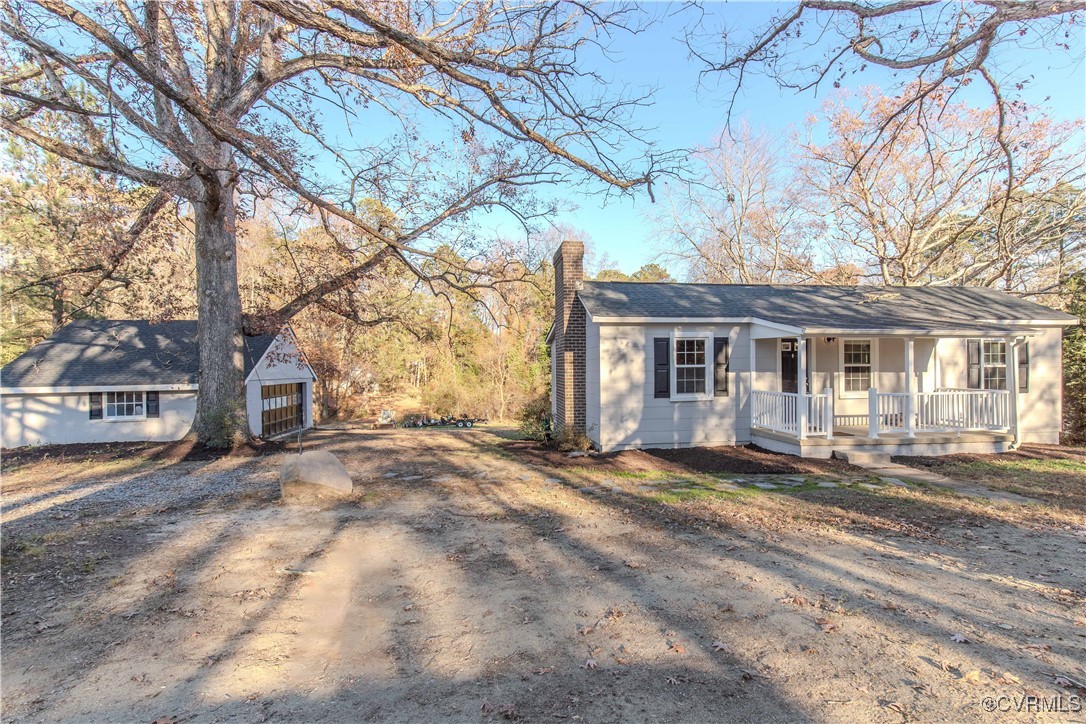 2015 Hicks Road Richmond, VA 23235 - Photo 3 of 31 Ranch-style home with an outbuilding, a porch, and