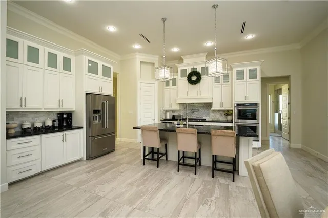 a kitchen with a sink and microwave
