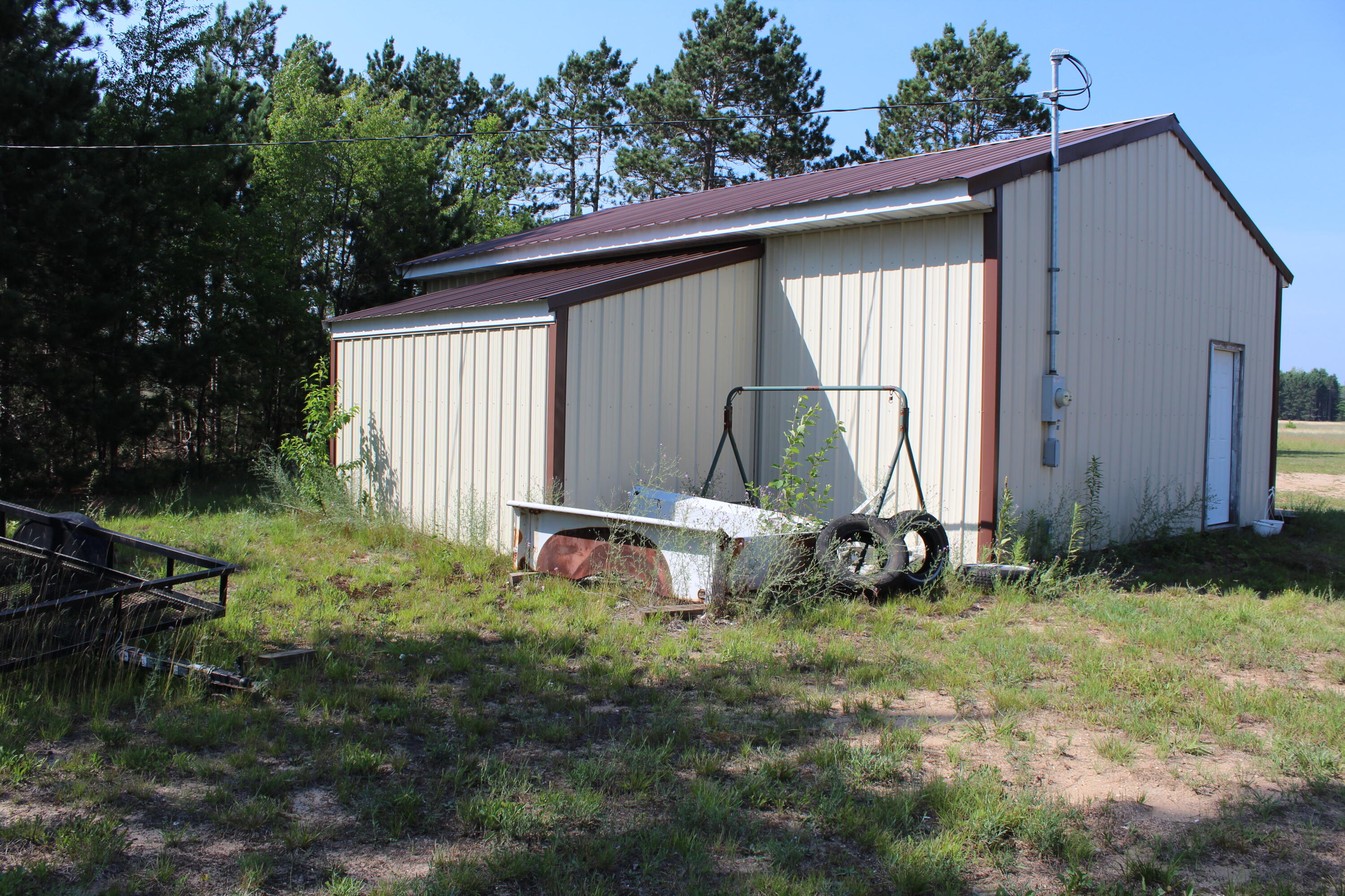 12375 9 Mile Road Kaleva, MI 49645 - Photo 23 of 30 back of garage