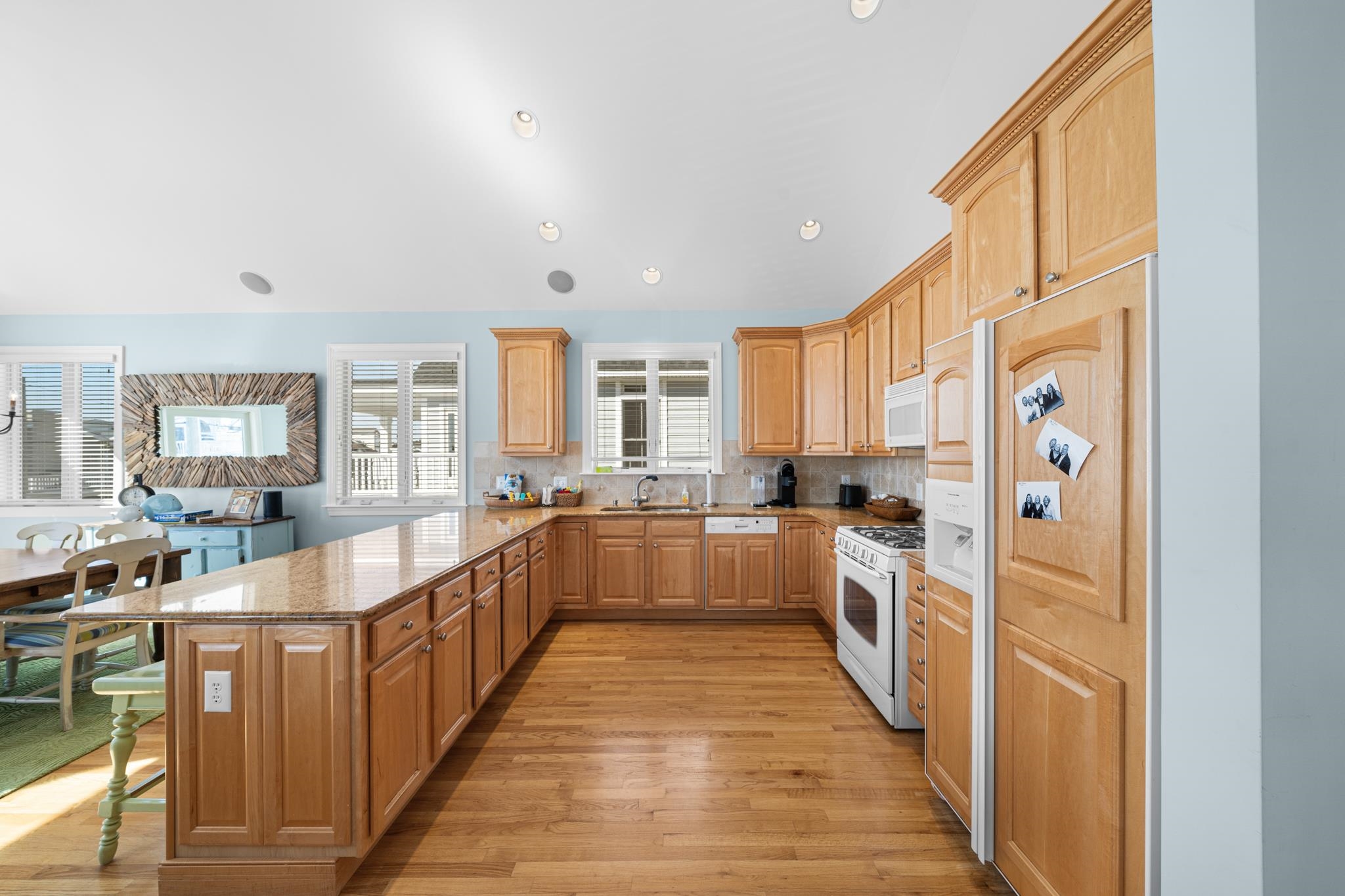 55 West 29th Avalon, NJ 08202 - Photo 11 of 32 a kitchen with stainless steel appliances a lot of counter space and a window