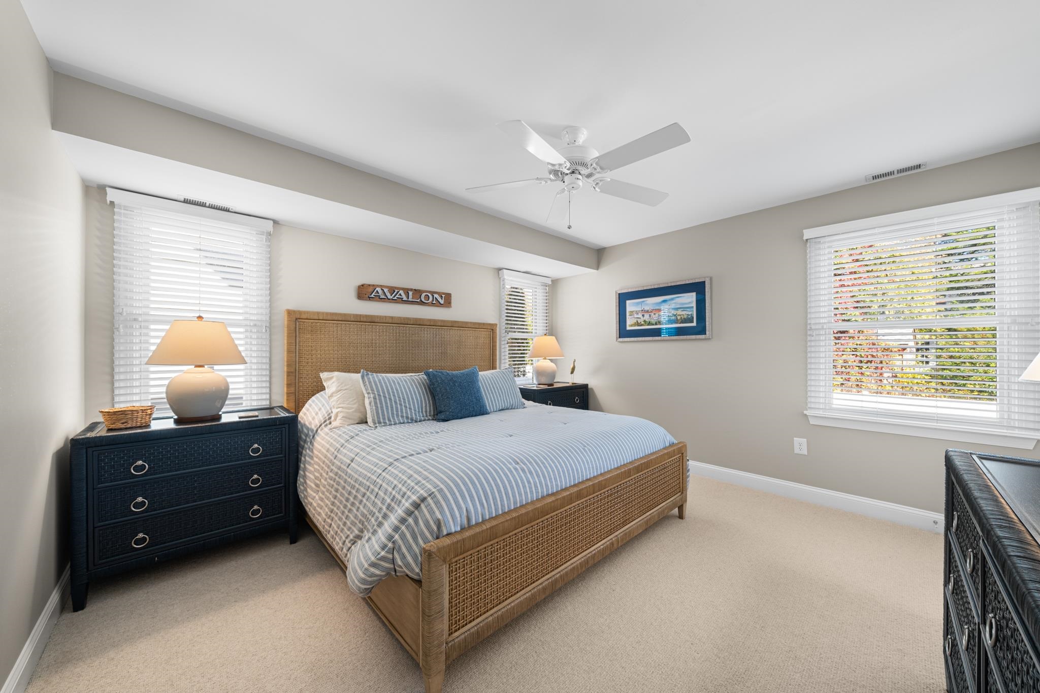 55 West 29th Avalon, NJ 08202 - Photo 19 of 32 a bedroom with a bed and window