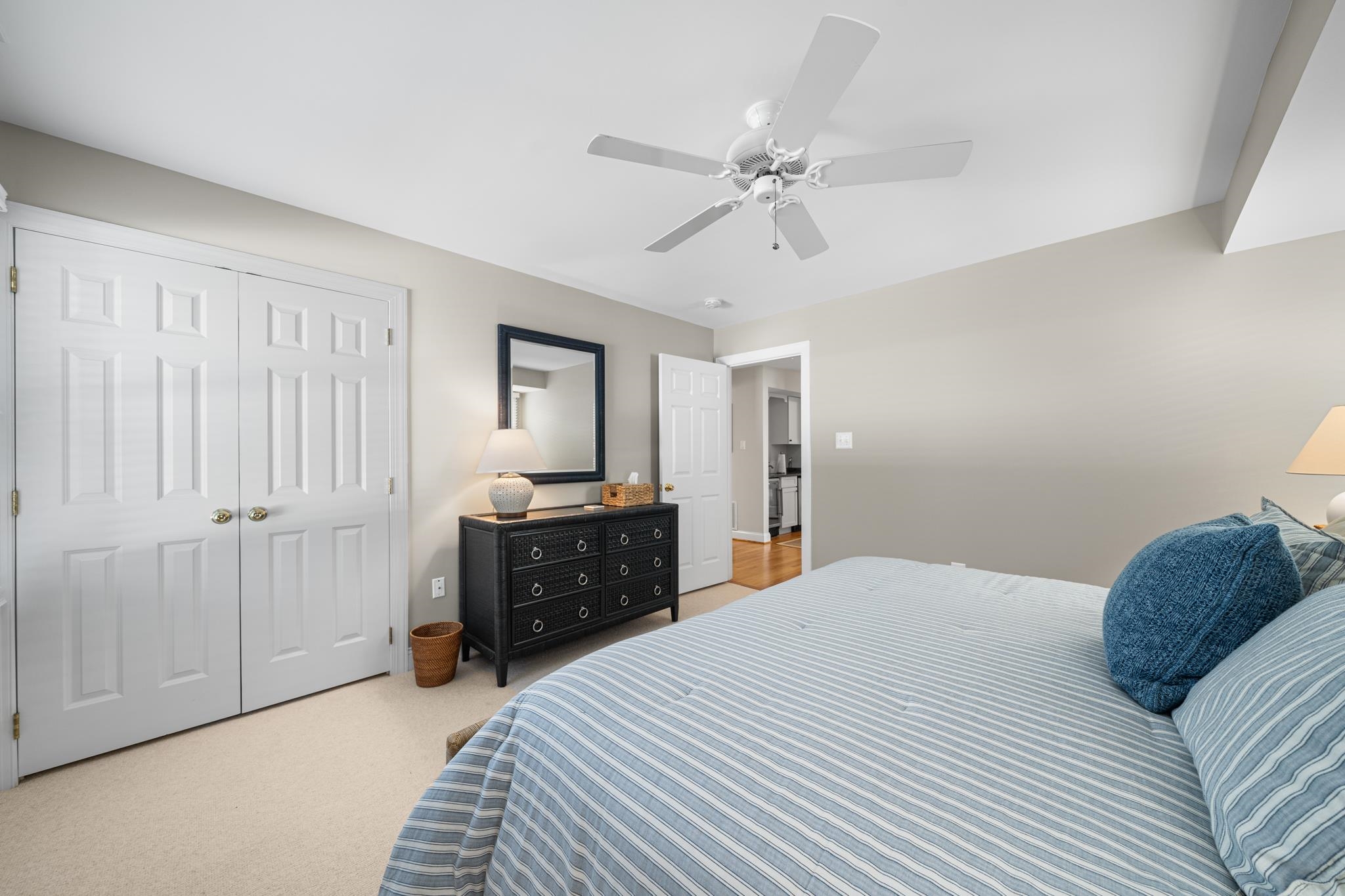 55 West 29th Avalon, NJ 08202 - Photo 20 of 32 a bedroom with a bed and cabinet