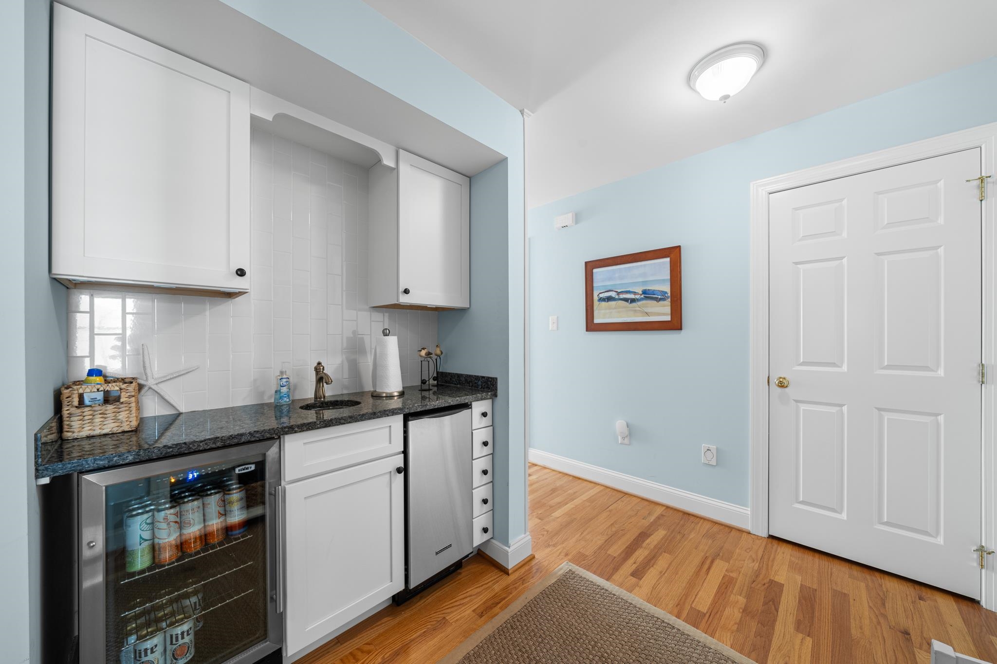 55 West 29th Avalon, NJ 08202 - Photo 24 of 32 a kitchen with a sink and cabinets