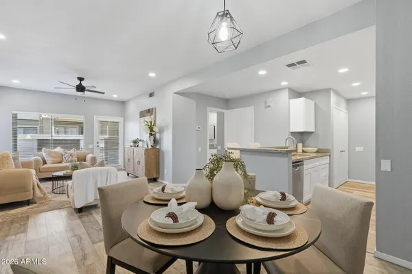 a view of a dining room with furniture