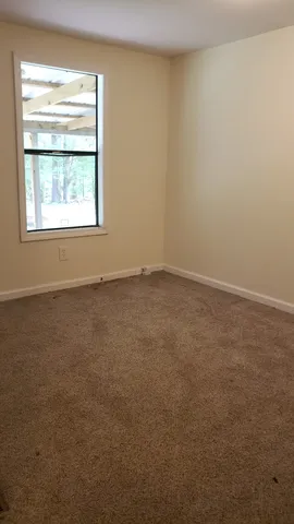 an empty room with a window