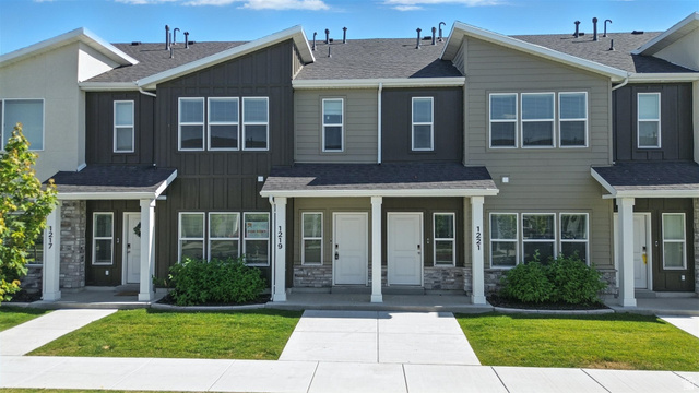 1221 West 1870 South Logan, UT 84321 - Photo 2 of 20 Modern townhome exteriors featuring varied siding materials and stone accents