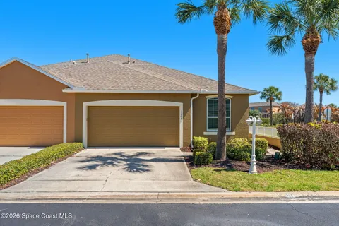 a front view of a house with yard