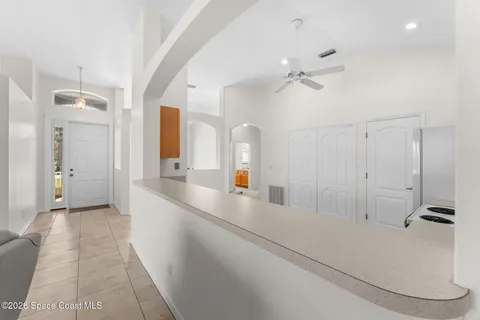 a bathroom with a sink a mirror and shower