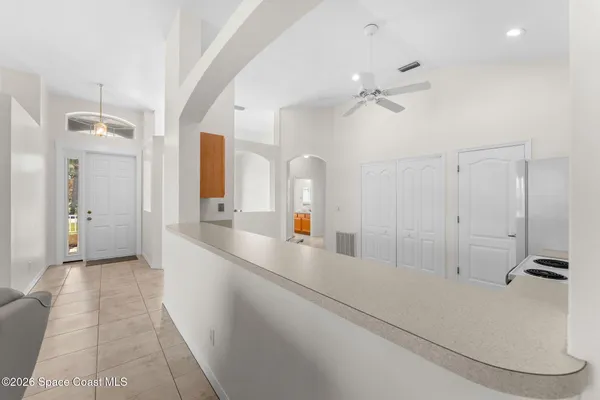 a bathroom with a sink a mirror and shower