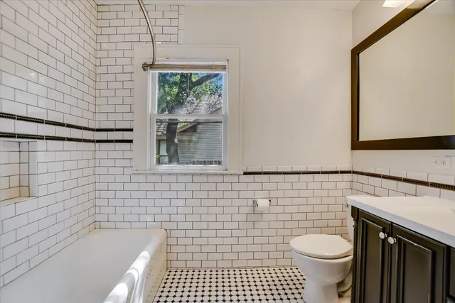 a bathroom with a sink and a toilet