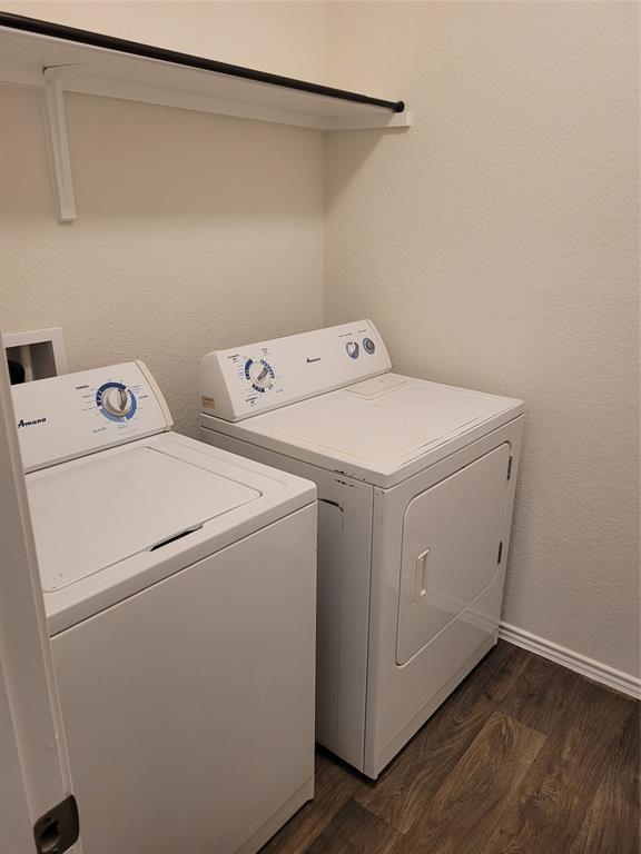 14917 Gypsum Mill Road Manor, TX 78653 - Photo 18 of 28 Functional utility space with durable flooring and convenient overhead shelving.