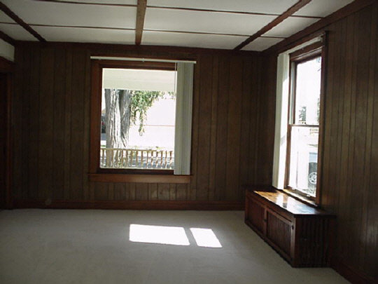 412 North 9th Street Rochelle, IL 61068 - Photo 2 of 3 a view of an empty room with a window