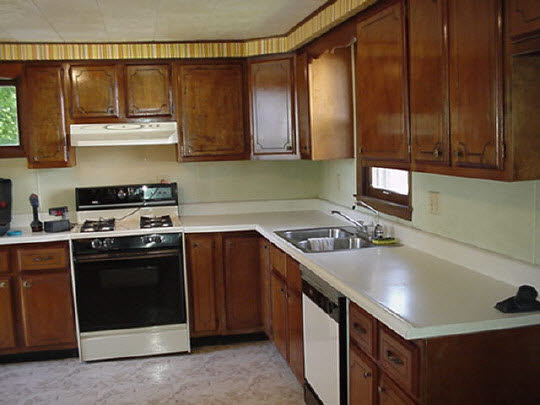 412 North 9th Street Rochelle, IL 61068 - Photo 3 of 3 a kitchen with stainless steel appliances granite countertop a stove and a sink