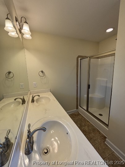5407 Nessee Street Fayetteville, NC 28314 - Photo 16 of 22 a bathroom with a sink and a mirror