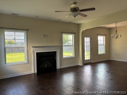 5407 Nessee Street Fayetteville, NC 28314 - Photo 6 of 22 a view of an empty room with exposed radiator and fireplace