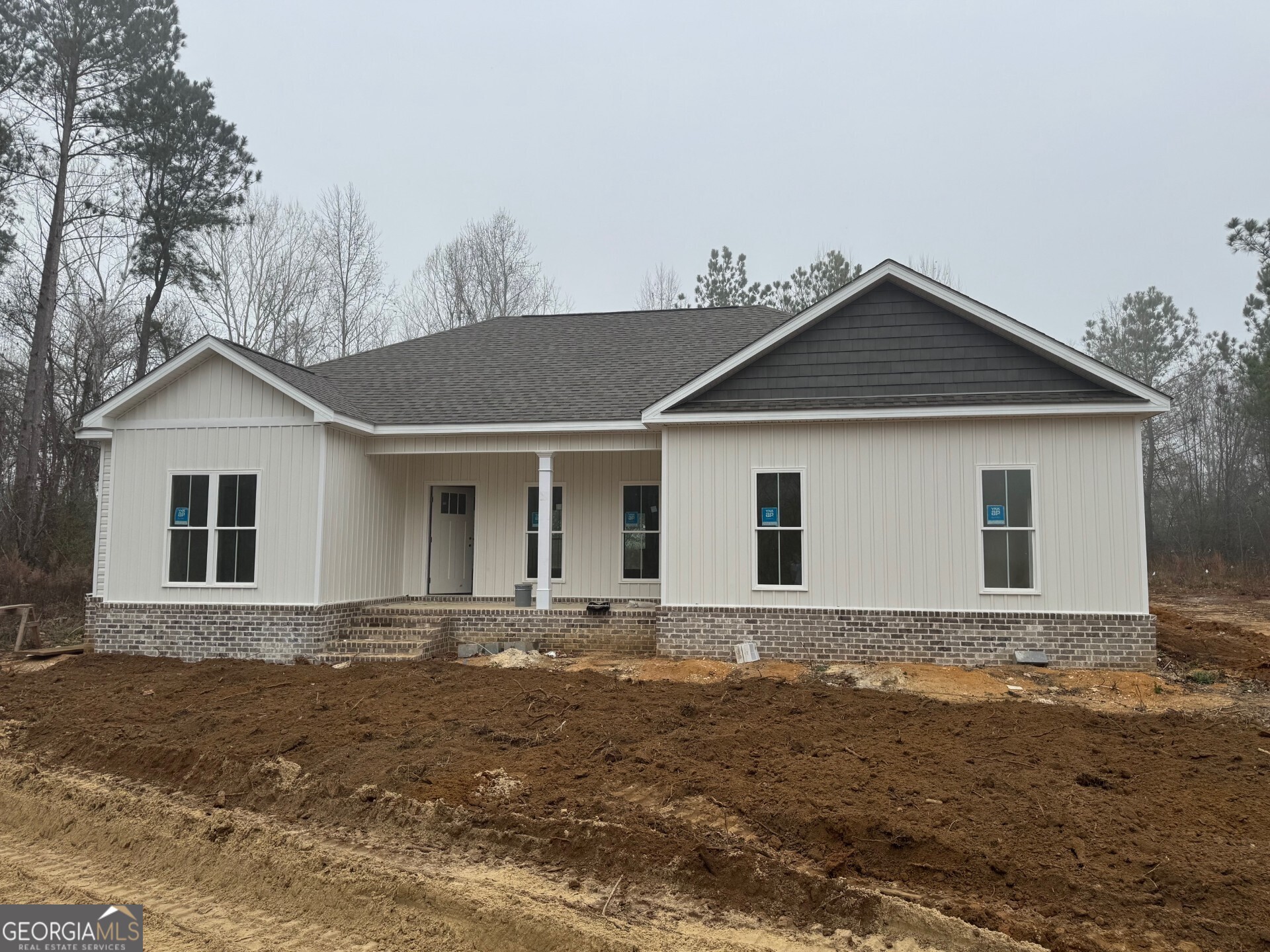 4335 Nessmith Road Statesboro, GA 30458 - Photo 1 of 1 a front view of a house with a yard