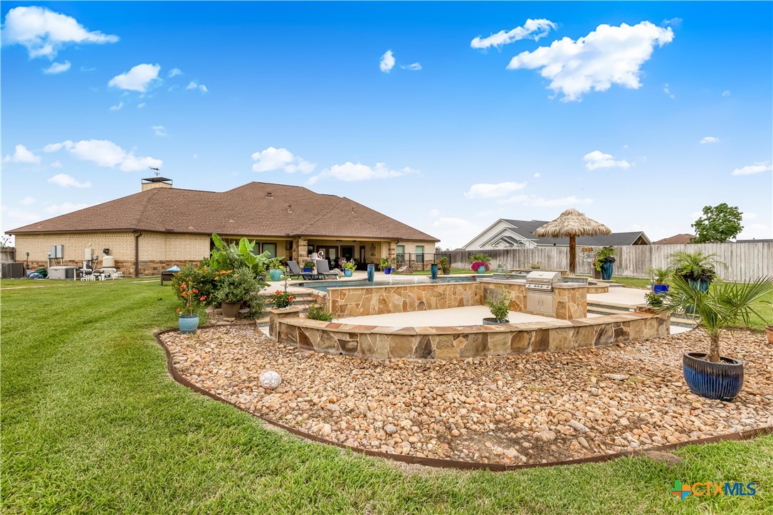 254 Sendera Loop Victoria, TX 77904 - Photo 8 of 48 a view of a house with swimming pool and sitting area
