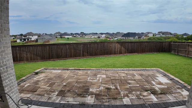 a view of a backyard with a garden