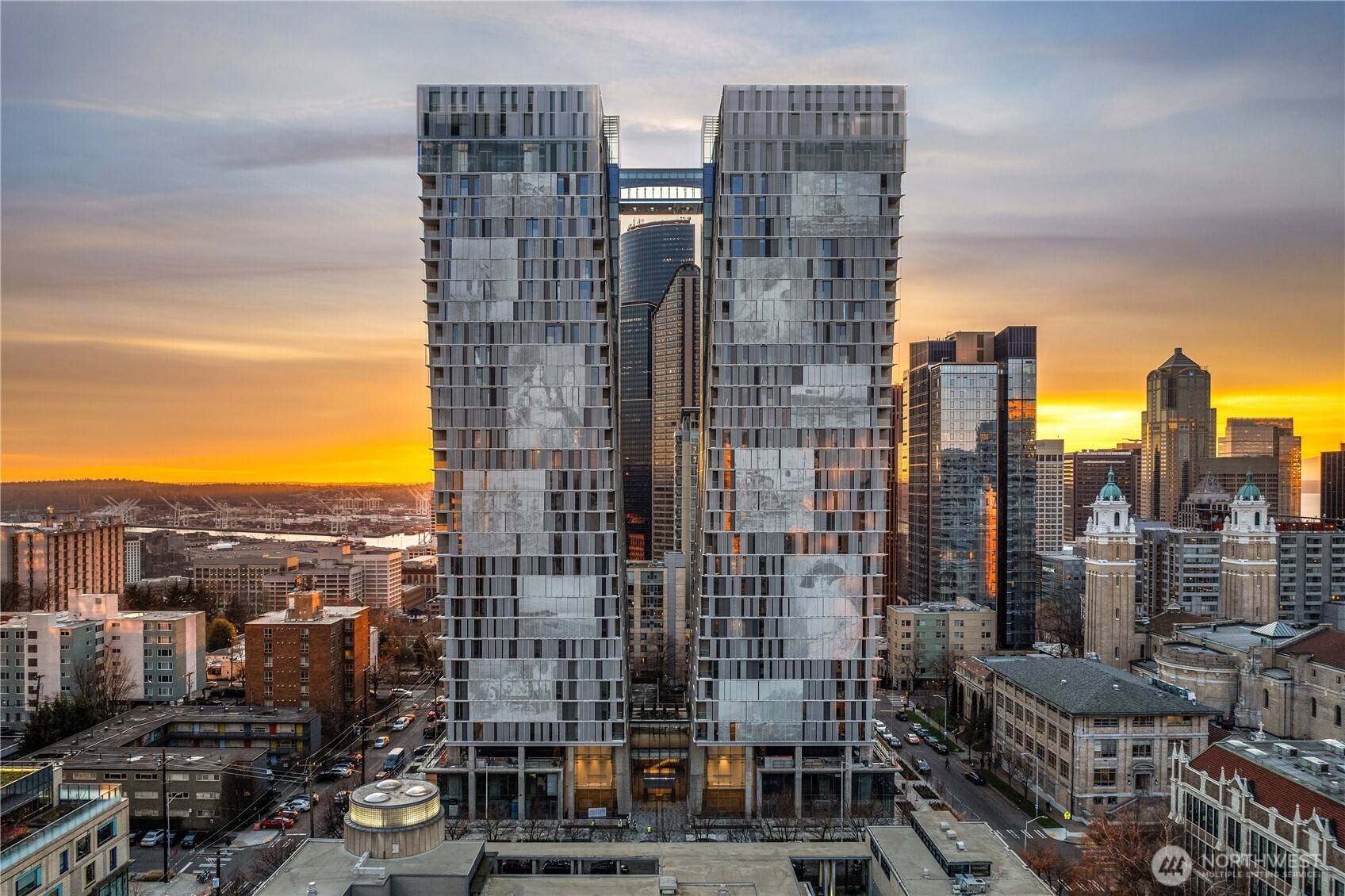 a view of a city with tall buildings