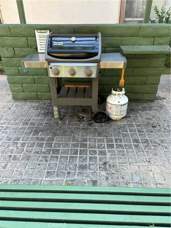 a view of a chairs and table on the deck